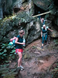 Climbing out of Kepayanag Besar cave in Taman Negara